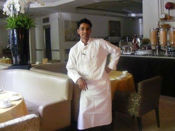 Chef Rasel in his whites early in his career